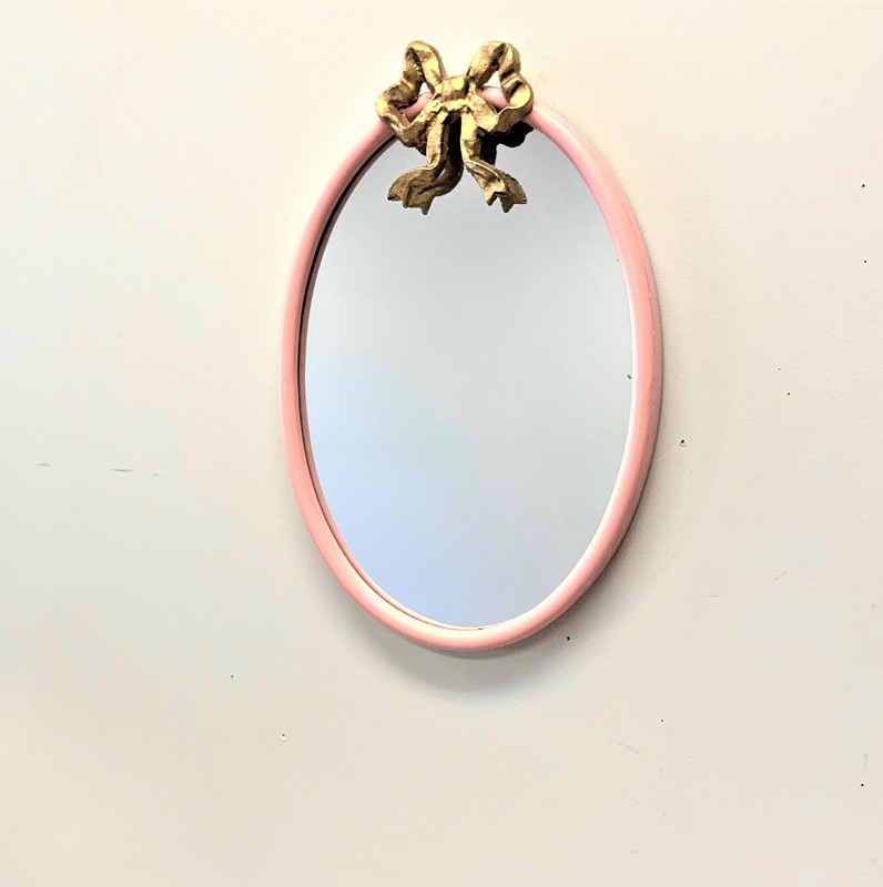 10x1.4x15" Oval Pink Mirror with Iron Bow HD7153